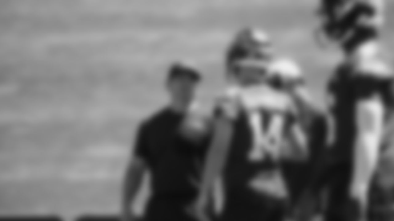 Seahawks head coach Mike Macdonald and quarterback Sam Darnold (14) on day two of training camp on July 24, 2025 at the Virginia Mason Athletic Center.