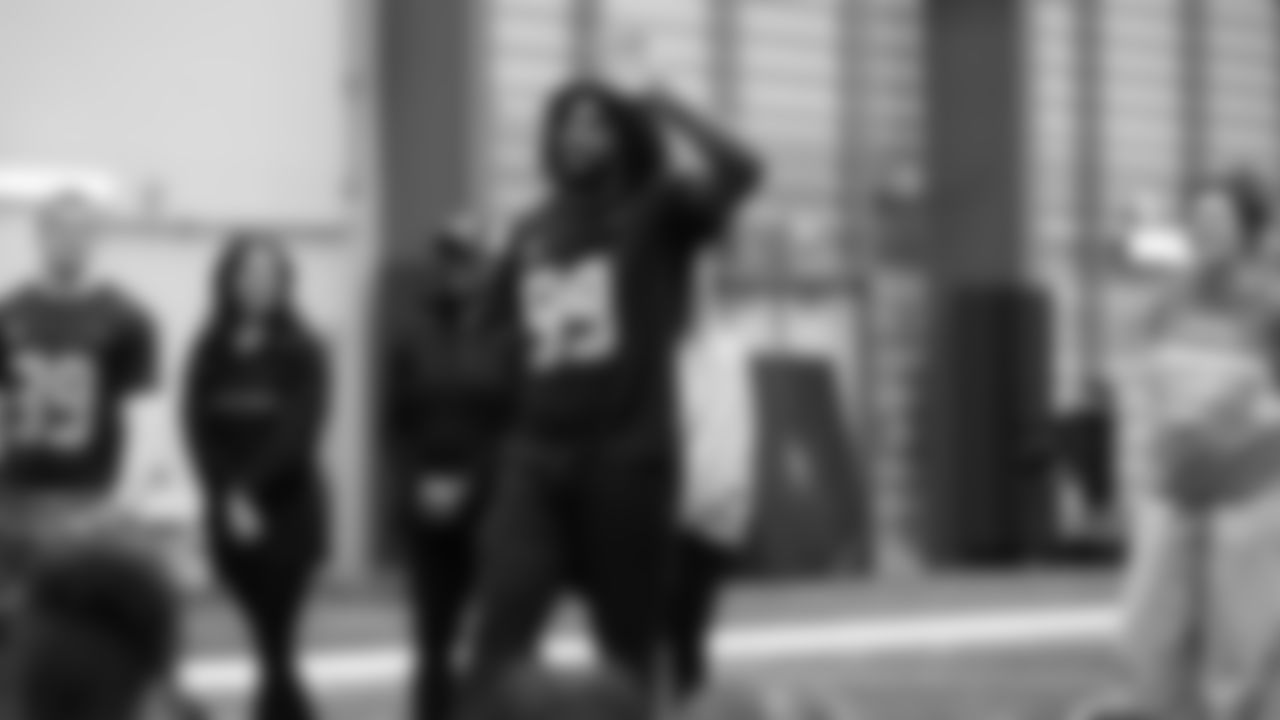 The Seahawks Women's Association packed girls flag kits and hosted a free girls flag football camp at the Seahawks training facility on Saturday, November 8, 2025.