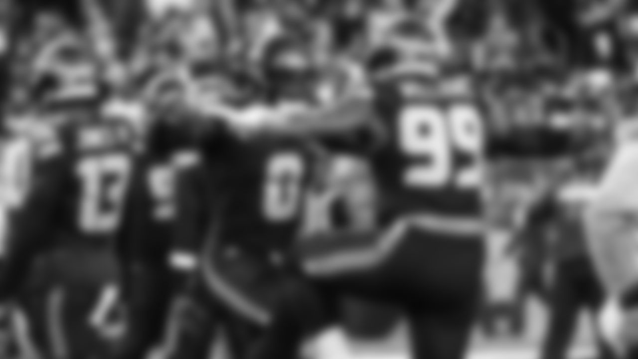 Seahawks defensive end DeMarcus Lawrence (0) and defensive end Leonard Williams (99) warms up at Lumen Field for the NFC divisional round game vs. the San Francisco 49ers on January 17, 2026.