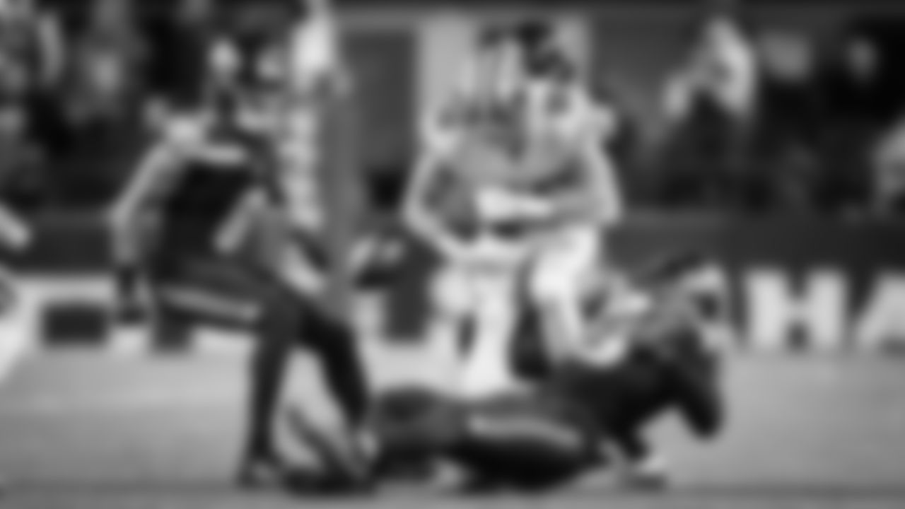 Seahawks linebacker Ernest Jones IV knocks the ball loose for a fumble recovered by teammate Julian Love.