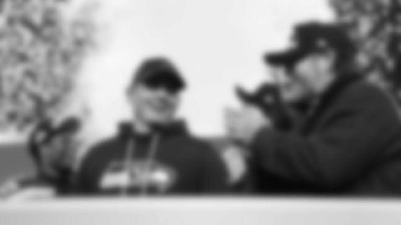 Seattle Seahawks head coach Mike Macdonald, middle, smiles next to president of football operations/general manager John Schneider, right, after the NFC Championship NFL football game against the Los Angeles Rams. Sunday, Jan. 25, 2026, in Seattle. (AP Photo/Lindsey Wasson)