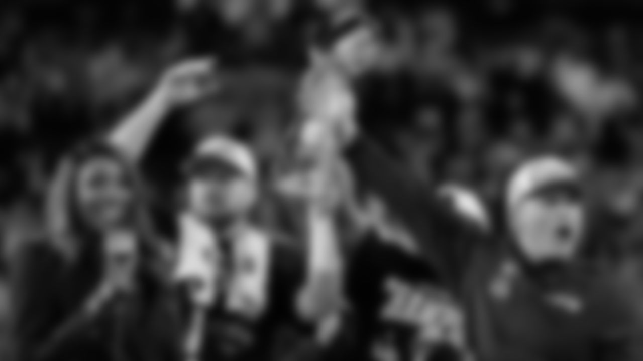 Seattle Seahawks head coach Mike MacDonald, right, and quarterback Sam Darnold lift the Lombardi Trophy after win over the New England Patriots in the NFL Super Bowl 60 football game, Sunday, Feb. 8, 2026, in Santa Clara, Calif. (AP Photo/Julio Cortez)