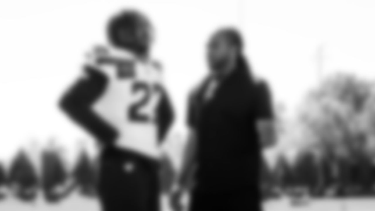 Seahawks cornerback Riq Woolen (27) with Seahawks Legend Richard Sherman at practice on August 12, 2025 at the Virginia Mason Athletic Center.