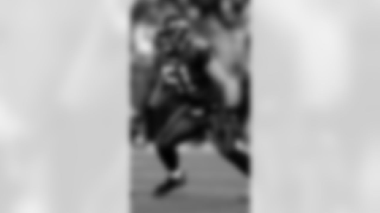 Seattle Seahawks linebacker Lofa Tatupu in action during the NFC championship football game against the Carolina Panthers in Seattle, Sunday, Jan. 22, 2006. (AP Photo/John Froschauer)