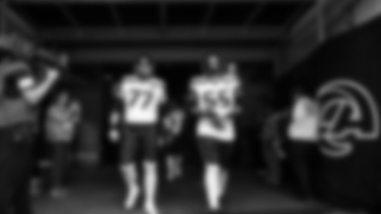 Seahawks guard Bryce Cabeldue (77) and center Olu Oluwatimi (55) during pregame warmups at SoFi Stadium for the Week 11 matchup at the L.A. Rams.