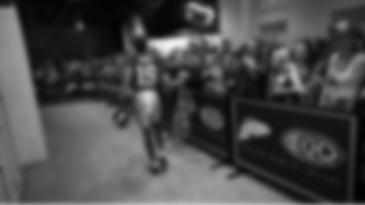 Seahawks wide receiver Jake Bobo (19) walks through the Emerald Queen Casino tunnel club at Lumen Field for the Week 5 matchup vs. the Buccaneers.