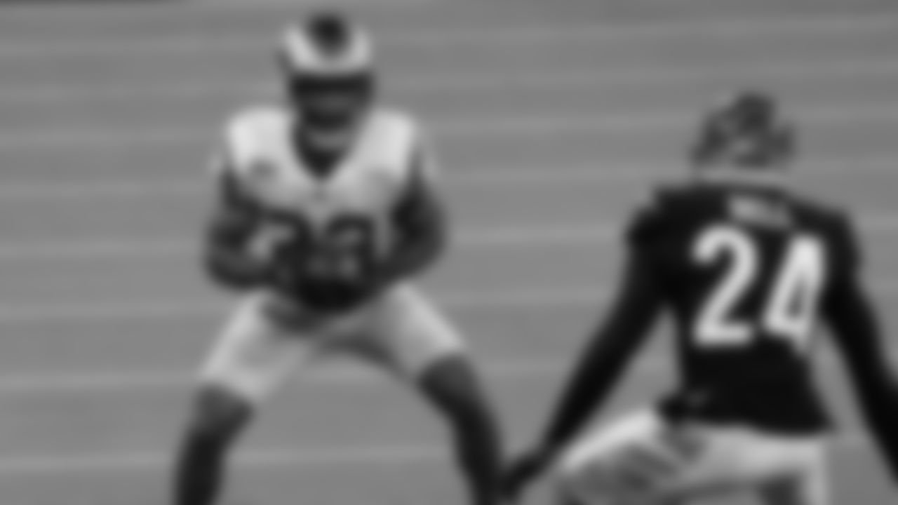 Los Angeles Rams running back Cam Akers (23) runs against Cincinnati Bengals strong safety Vonn Bell (24) during the second half of the NFL Super Bowl 56 football game Sunday, Feb. 13, 2022, in Inglewood, Calif. (AP Photo/Ted S. Warren)