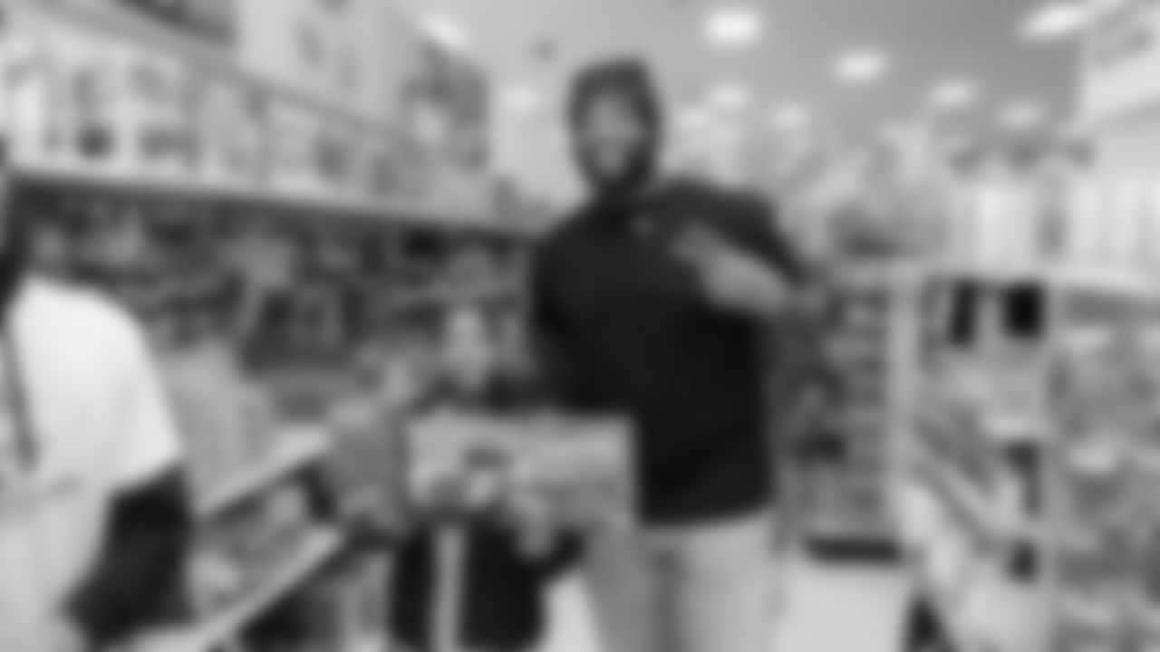 Seahawks offensive lineman Josh Jones was joined by fellow offensive linemen as they hosted a holiday shopping spree for kids from the Boys & Girls Club on December 9, 2025.