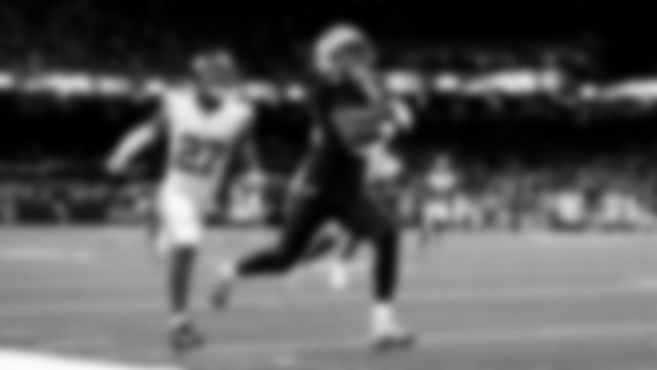 New Orleans Saints wide receiver Rashid Shaheed (22) runs the ball past New York Giants safety Tyler Nubin (27) to score a touchdown during an NFL football game, Sunday, Oct. 5, 2025, in New Orleans. (AP Photo/Tyler Kaufman)