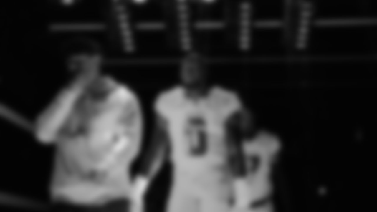 Seahawks defensive end DeMarcus Lawrence (0) walks through the Emerald Queen Casino tunnel club at Lumen Field for the Week 16 matchup vs. Rams.