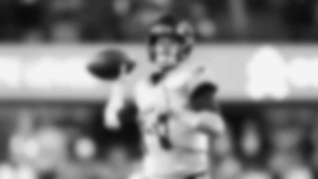 Seahawks quarterback Sam Darnold (14) warms up at Lumen Field for the Week 16 matchup vs. the L.A. Rams.