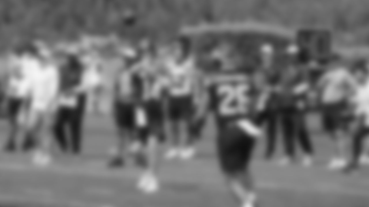 Seahawks quarterback Sam Darnold (14) and running back Zach Charbonnet (26) practiced on August 13, 2025 at the Virginia Mason Athletic Center.