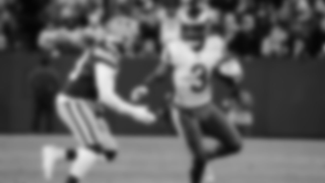 Green Bay Packers safety Rudy Ford (20) stops Los angles Rams running back Cam Akers (3) in the first half of an NFL football game in Green Bay, Wis. Monday, Dec. 19, 2022. (AP Photo/Morry Gash)