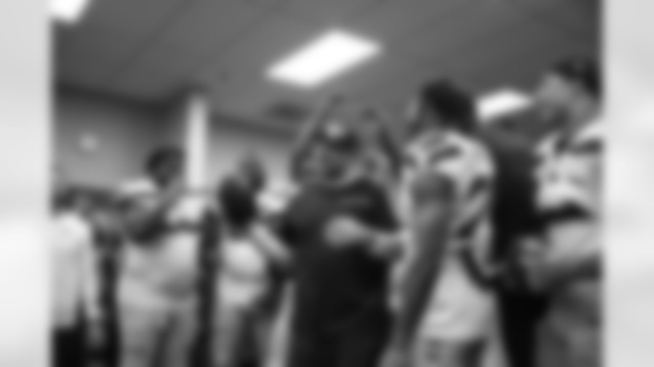 Seahawks offensive line coach Scott Huff celebrates the Week 14 win over the Arizona Cardinals on Sunday, December 8, 2024 at State Farm Stadium in Glendale, Arizona.