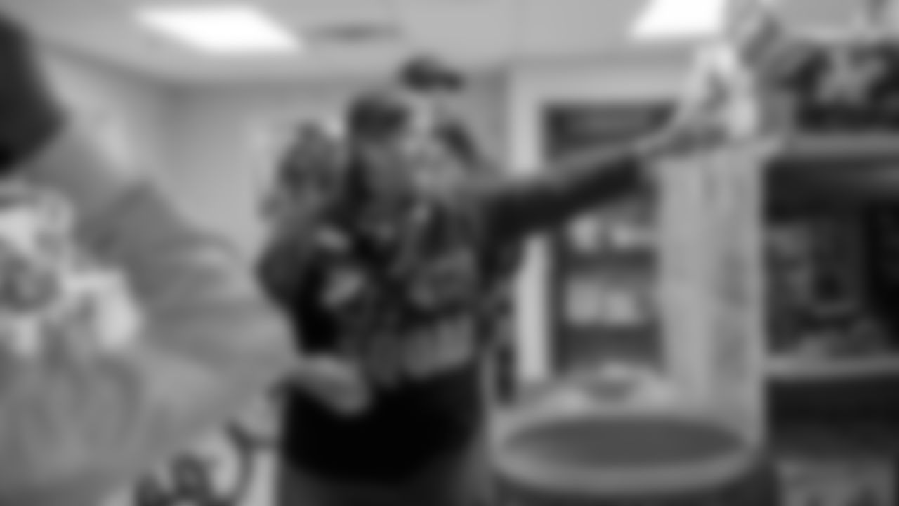 Seahawks Fullback Brady Russell, the Seahawks Dancers, and Blitz spent the day volunteering at Santa's Castle on Joint Base Lewis-McChord to celebrate the holidays and support service members and their families.