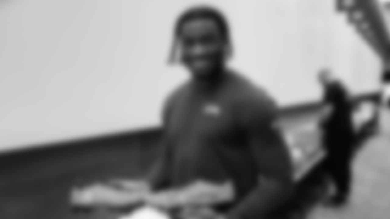 Seahawks quarterback Jalen Milroe (6) unboxed his My Cause My Cleats at the Virginia Mason Athletic Center.