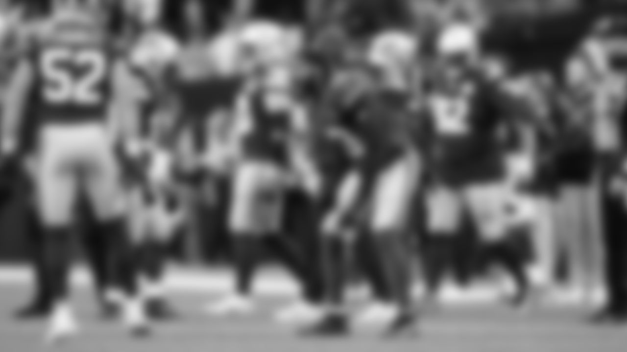 Linebacker Ernest Jones IV lets out a yell after teammate Drake Thomas records a quarterback sack.