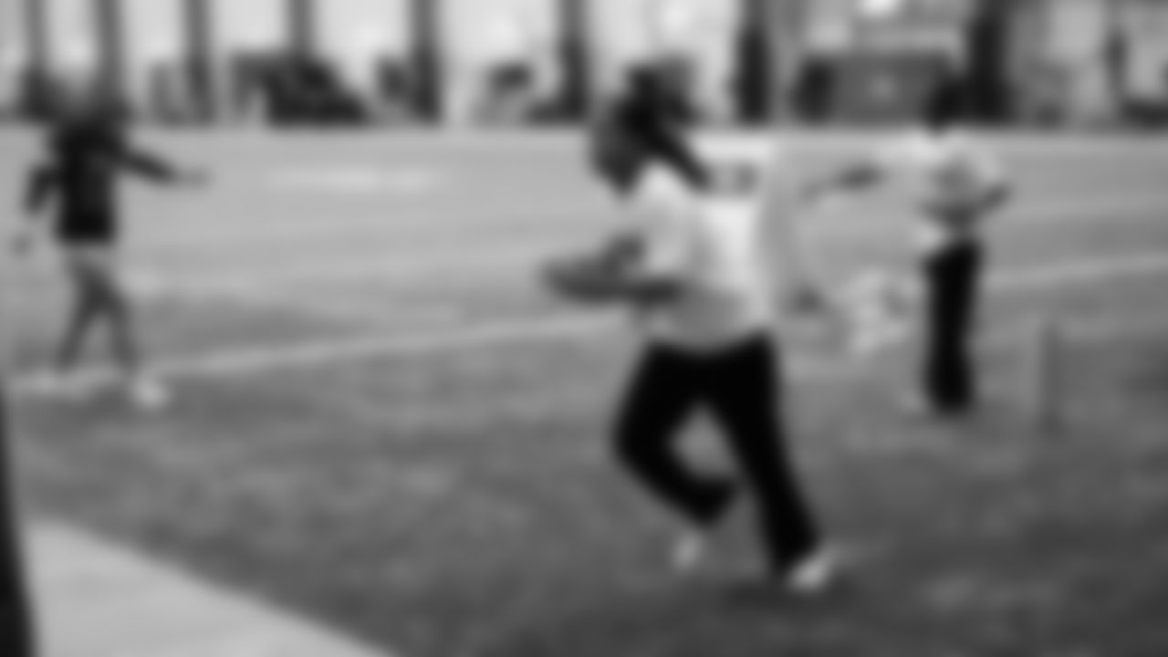 The Seahawks Women's Association packed girls flag kits and hosted a free girls flag football camp at the Seahawks training facility on Saturday, November 8, 2025.