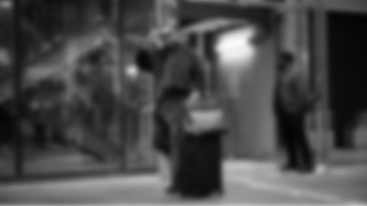 Seahawks linebacker Uchenna Nwosu acknowledges fans outside of the team's hotel who wished him Happy Birthday on game day.