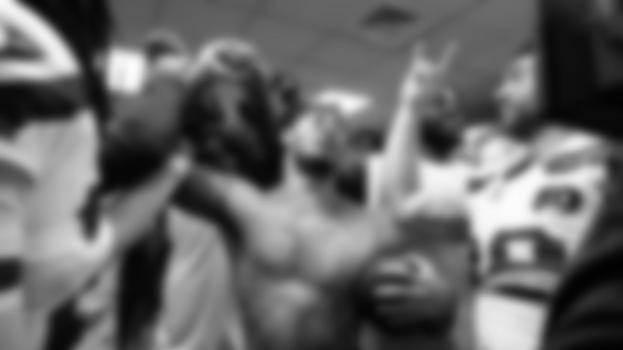 Seahawks receiver Jaxon Smith-Njigba brings the team up after being awarded the game ball for his two touchdown performance which also saw him break the team record for receiving yards in a single season.