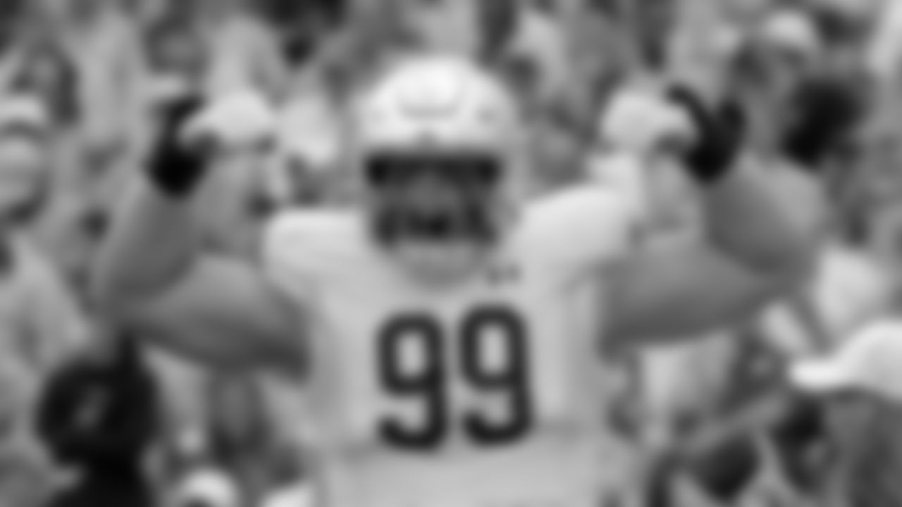Notre Dame defensive lineman Rylie Mills (99) celebrates after making a quarterback sack during the first half of an NCAA college football game against North Carolina in Chapel Hill, N.C., Saturday, Sept. 24, 2022 (AP Photo/Chris Seward)