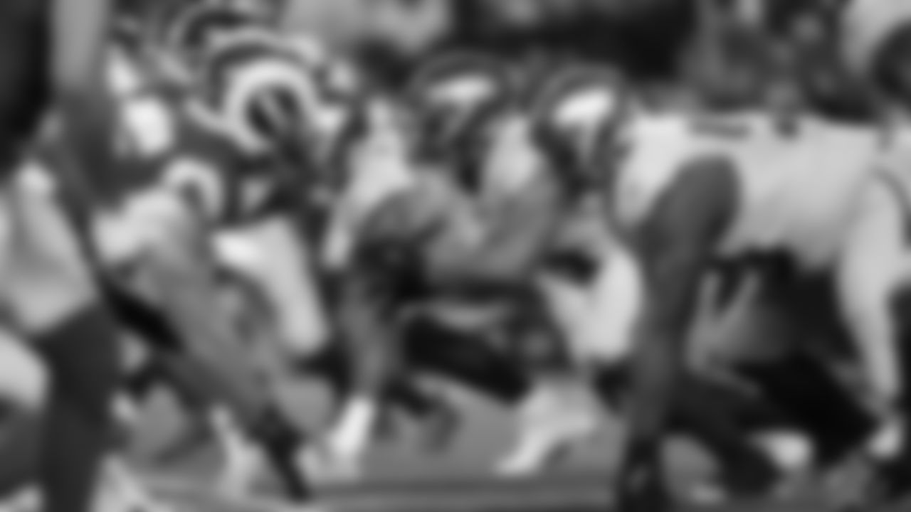 The Seahawks Rivalries helmets shone green and blue under the lights at Lumen Field.