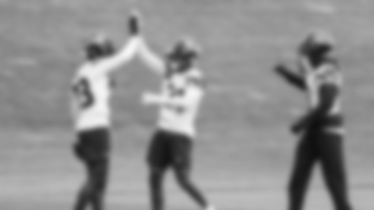 Seahawks safety D'Anthony Bell (23), cornerback Devon Witherspoon (21) and safety Coby Bryant (8) participated in a workout on day five of OTAs on Wednesday, June 4, 2025 at the Virginia Mason Athletic Center.
