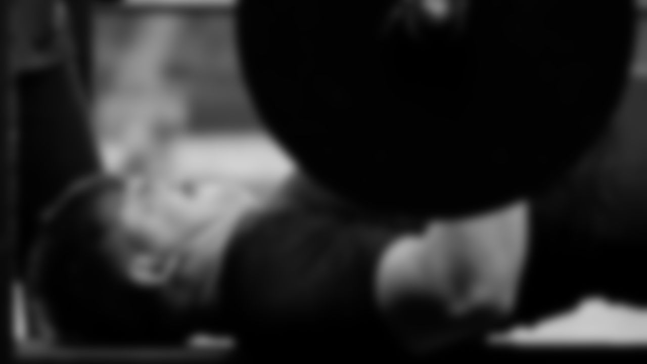 North Dakota State offensive lineman Grey Zabel lifts weights at the NFL football scouting combine Monday, March 3, 2025, in Indianapolis. (AP Photo/George Walker IV)