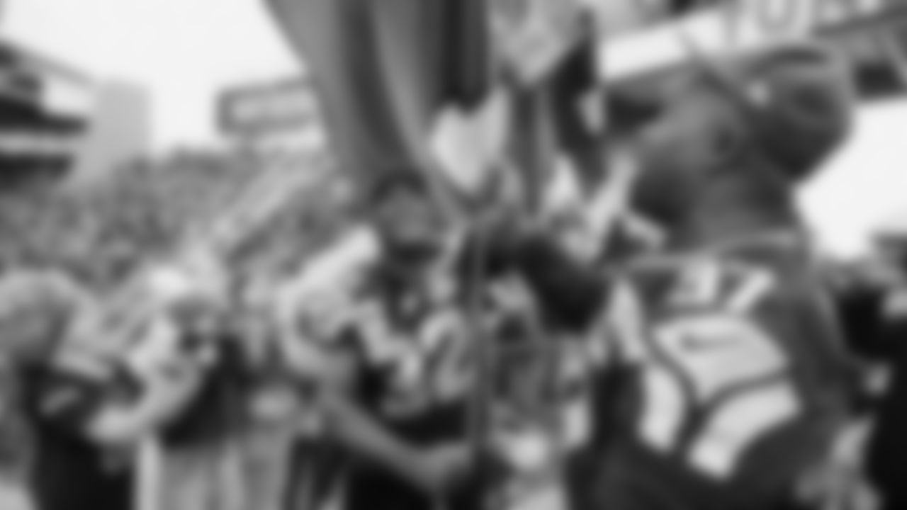 Seahawks Legends Rufus Porter and John L. Williams raise 12 flag in week 15 on December 14, 2025