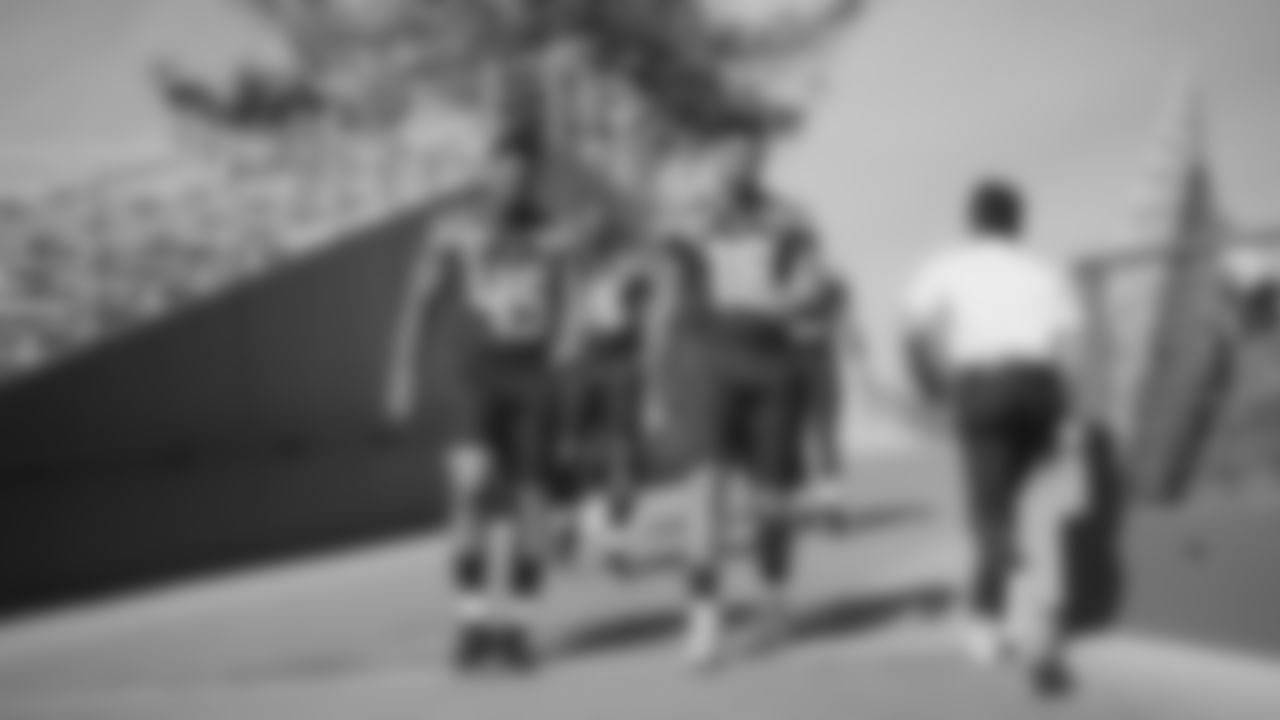 Seahawks linebacker Chris Paul Jr. (49) and tight end Elijah Arroyo (18) during the Super Bowl LX team photo on February 7, 2026.