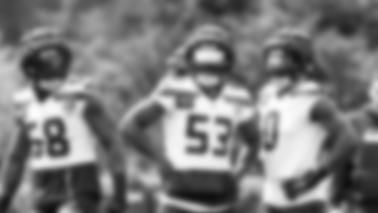Seahawks linebacker Boye Mafe (53) and defensive end DeMarcus Lawrence (0) practiced on day three of training camp on July 25, 2025 at the Virginia Mason Athletic Center.