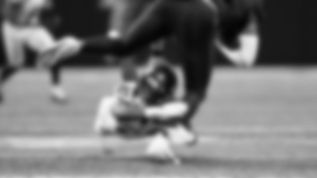 Seahawks cornerback Devon Witherspoon makes an open field tackle.