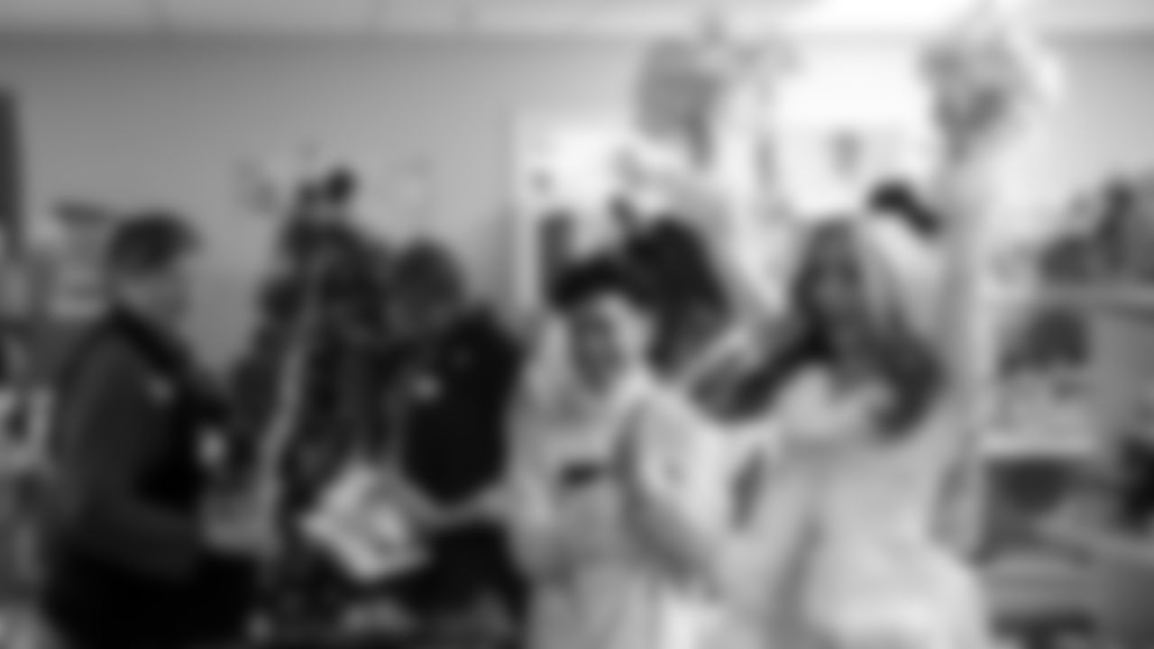 Seahawks Fullback Brady Russell, the Seahawks Dancers, and Blitz spent the day volunteering at Santa's Castle on Joint Base Lewis-McChord to celebrate the holidays and support service members and their families.