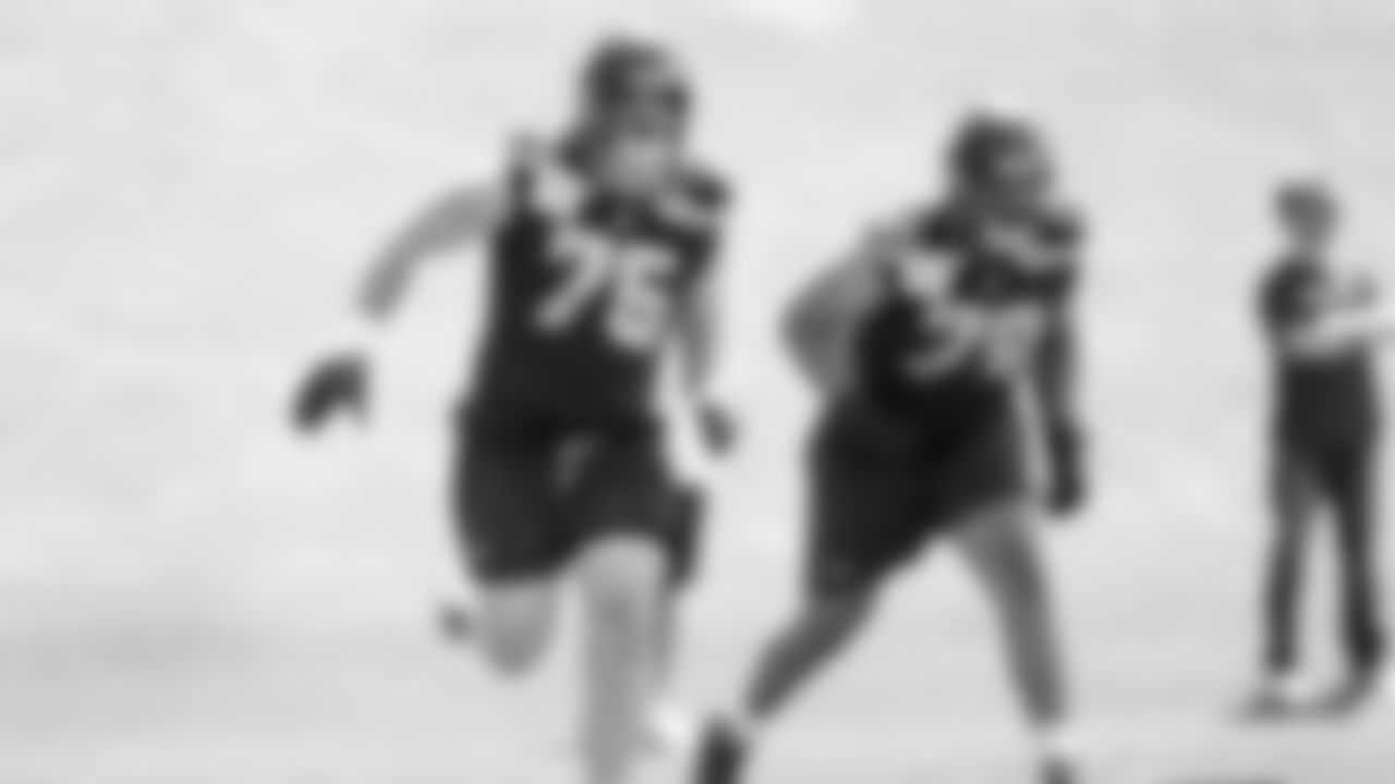 Guard Grey Zabel (76) and tackle/guard Mason Richman (78) practiced on day one of rookie minicamp on May 2, 2025 at the Virginia Mason Athletic Center.