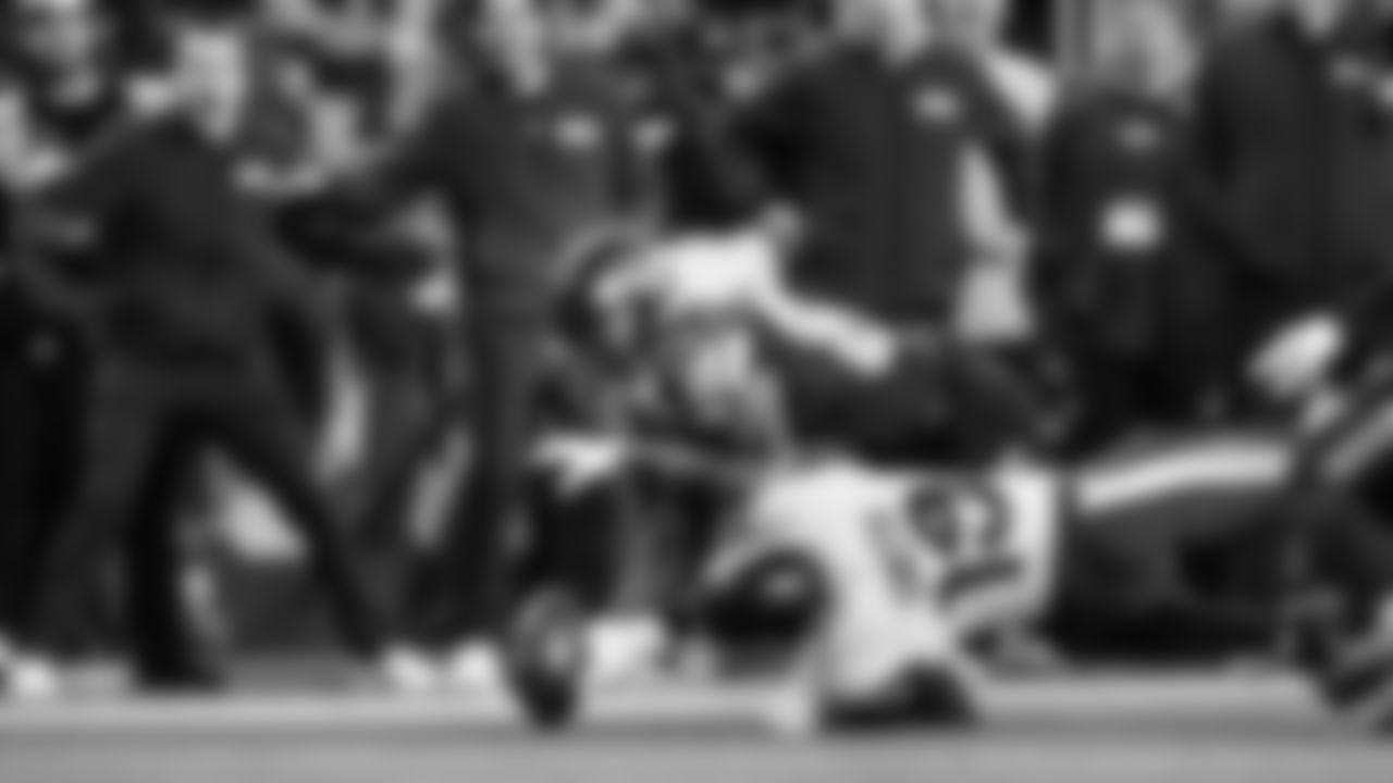 Seattle's Dareke Young recovers a fumbled punt return to set up a Seahawks touchdown.