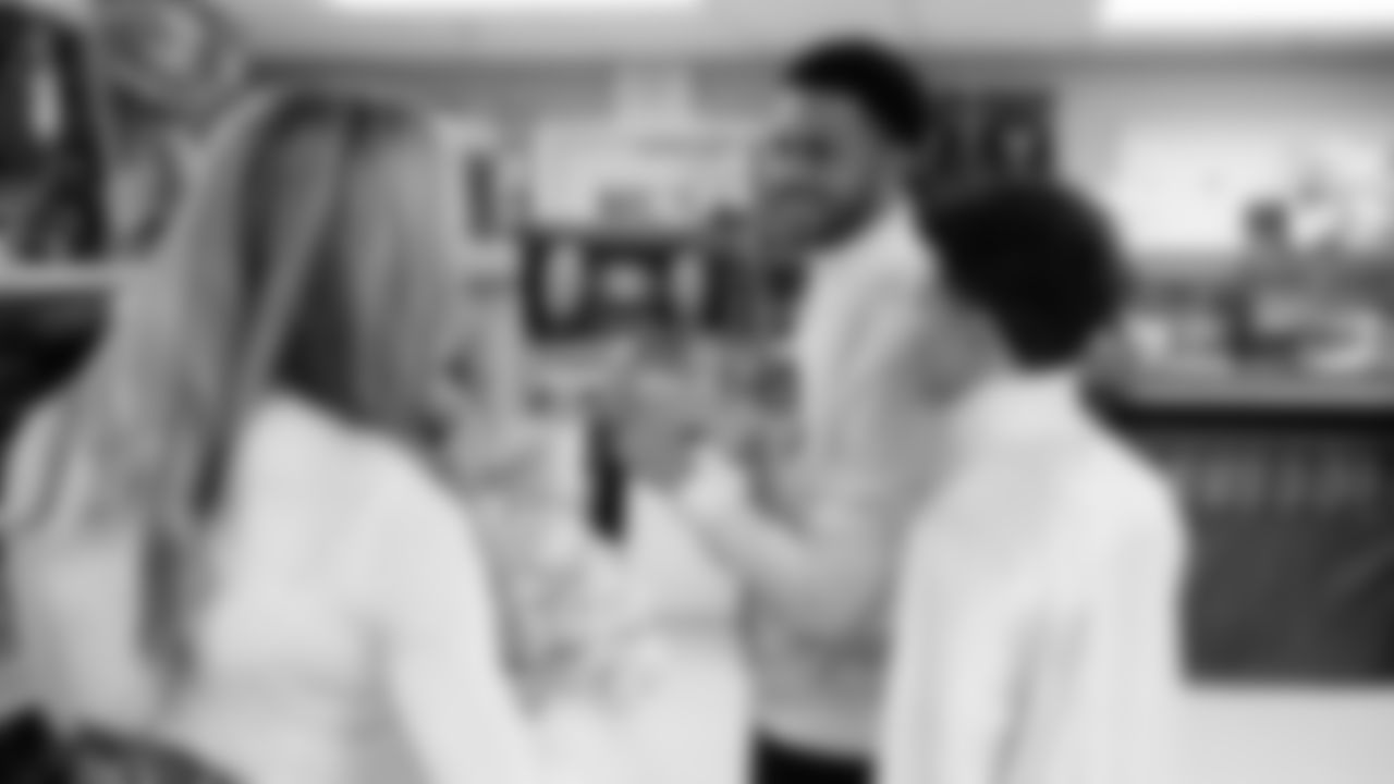 Seahawks Fullback Brady Russell, the Seahawks Dancers, and Blitz spent the day volunteering at Santa's Castle on Joint Base Lewis-McChord to celebrate the holidays and support service members and their families.