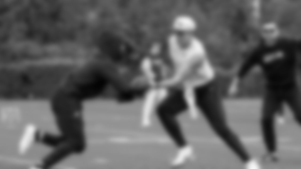 Seahawks quarterback Drew Lock (2) and running back Kenny McIntosh (25) participated in a workout on May 20, 2025 at the Virginia Mason Athletic Center.