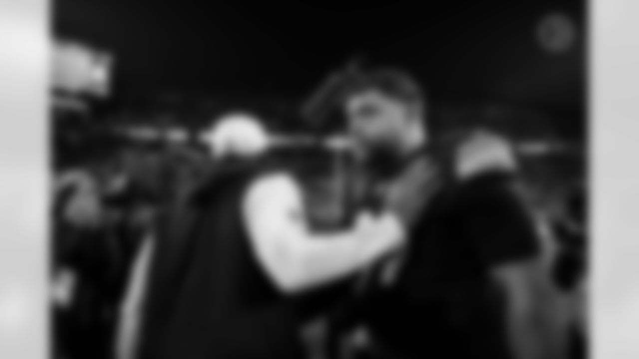 Pittsburgh Steelers head coach Mike Tomlin and Pittsburgh Steelers defensive tackle Cameron Heyward (97) following a regular season game between the Pittsburgh Steelers and the Baltimore Ravens, Sunday, Jan. 4, 2026 in Pittsburgh, PA. The Steelers defeated the Ravens 26-24. (Taylor Ollason / Pittsburgh Steelers)