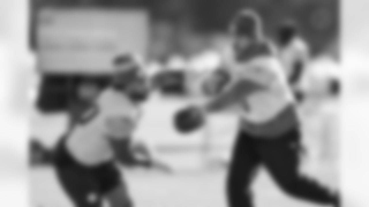 Pittsburgh Steelers quarterback Aaron Rodgers (8) and Pittsburgh Steelers running back Jaylen Warren (30) during practice at the UPMC Rooney Sports Complex preparing for a Week 16 matchup against the Detroit Lions, Wednesday, Dec. 17, 2025 in Pittsburgh, PA. (Karl Roser / Pittsburgh Steelers)