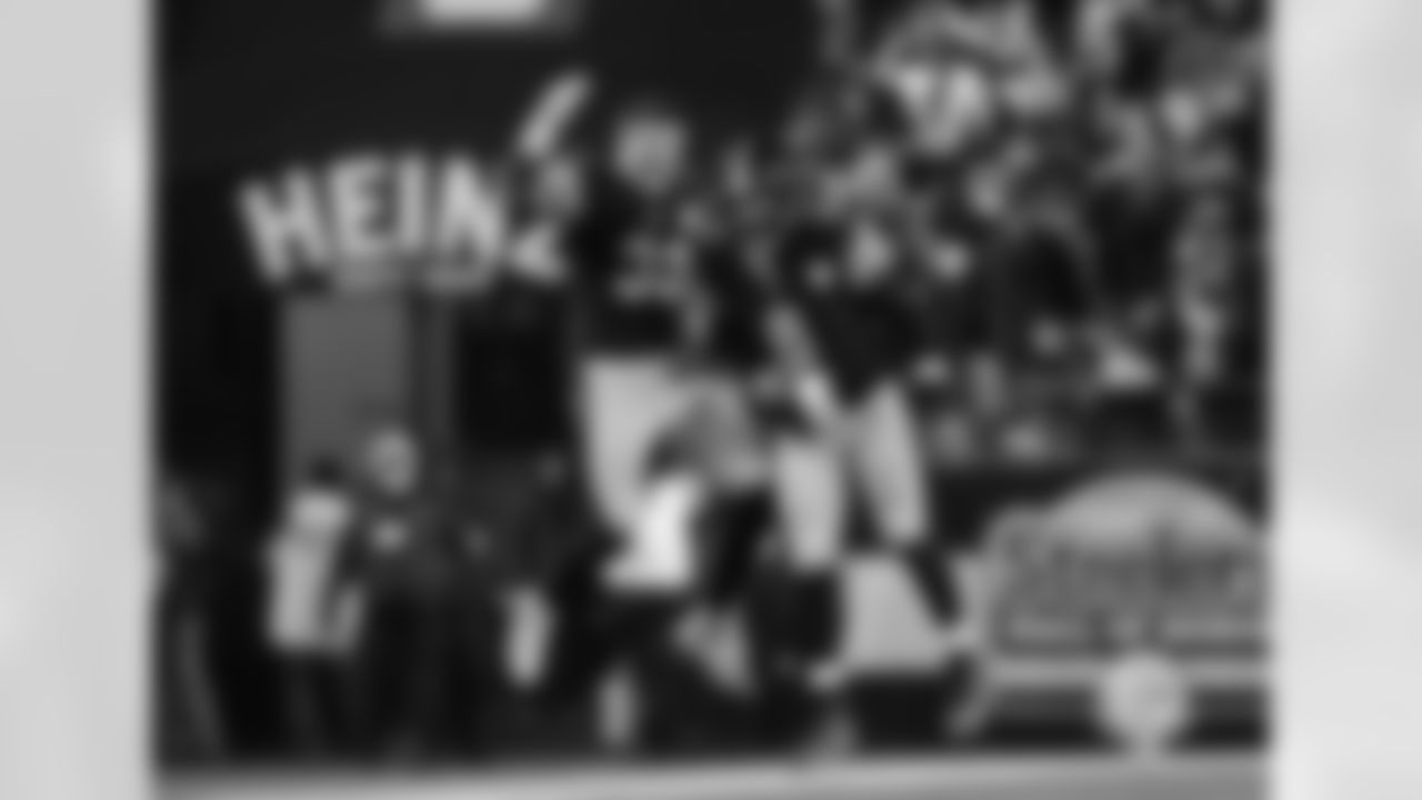 Pittsburgh Steelers quarterback Aaron Rodgers (8) and Pittsburgh Steelers linebacker Jack Sawyer (33) celebrate during a regular season game between the Pittsburgh Steelers and the Baltimore Ravens, Sunday, Jan. 4, 2026 in Pittsburgh, PA. The Steelers defeated the Ravens 26-24. Even if I'm in a position of capturing the game winning touchdown, I love to look for the quarterback to see what celebration comes from the play. Rodgers had connected with Calvin Austin for the touchdown, then sprinted to the sideline to celebrate with his teammates. (Taylor Ollason / Pittsburgh Steelers)
Model: Nikon D6 Lens(mm): 400 ISO: 5000 Aperture: 4 Shutter: 1/2000