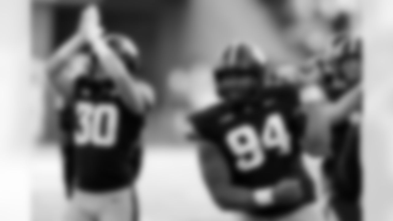 Iowa defensive lineman Yahya Black (94) celebrates after a safety during the first half of an NCAA college football game against Northwestern, Saturday, Oct. 26, 2024, in Iowa City, Iowa. (AP Photo/Charlie Neibergall)