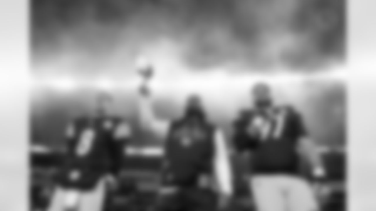 Pittsburgh Steelers quarterback Aaron Rodgers (8), head coach Mike Tomlin, and defensive tackle Cameron Heyward (97) during the national anthem prior to a postseason Wild Card game between the Pittsburgh Steelers and the Houston Texans, Monday, Jan. 12, 2026 in Pittsburgh, PA. The Texans beat the Steelers 30-6. (Karl Roser / Pittsburgh Steelers)