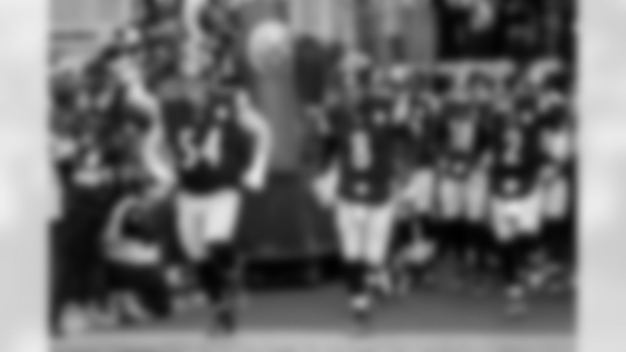 Pittsburgh Steelers quarterback Aaron Rodgers (8) and  center Zach Frazier (54) during a regular season game between the Pittsburgh Steelers and the Buffalo Bills, Sunday, Nov. 30, 2025 in Pittsburgh, PA.  (Karl Roser / Pittsburgh Steelers)