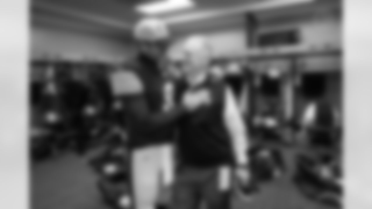 Pittsburgh Steelers quarterback Aaron Rodgers (8) and president Art Rooney II embrace in the locker room following a regular season game against the Baltimore Ravens, Sunday, Jan. 4, 2026 in Pittsburgh, PA. The Steelers defeated the Ravens 26-24, clinching the AFC North Division title. Following this win I made my way to the locker room. I was running back and forth photographing as many celebrations and interactions as possible. I saw both Rodgers and Mr. Rooney approaching each other and I moved in close, ready for the moment. (Karl Roser / Pittsburgh Steelers)

Model: NIKON Z 9
Lens (mm): 22
ISO: 5000
Aperture: 2.8
Shutter: 1/500