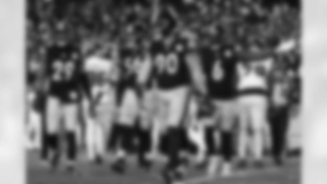 Pittsburgh Steelers safety Kyle Dugger (29), Pittsburgh Steelers linebacker Alex Highsmith (56),  Pittsburgh Steelers linebacker T.J. Watt (90) and Pittsburgh Steelers linebacker Patrick Queen (6)  during a postseason Wild Card game between the Pittsburgh Steelers and the Houston Texans, Monday, Jan. 12, 2026 in Pittsburgh, PA. (Taylor Ollason / Pittsburgh Steelers)