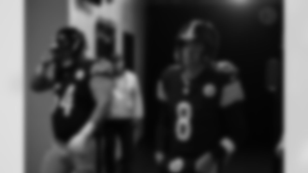 Pittsburgh Steelers center Zach Frazier (54) and Pittsburgh Steelers quarterback Aaron Rodgers (8) during a regular season game between the Pittsburgh Steelers and the Cincinnati Bengals, Sunday, Nov. 16, 2025 in Pittsburgh, PA. (Taylor Ollason / Pittsburgh Steelers)