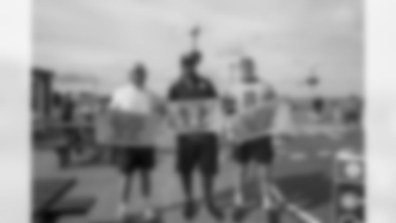 Pittsburgh Steelers legend Max Starks gives out Terrible Towels to locals on Wednesday, Sept. 24, 2025 in Sligo, Ireland. (Josh Veon / Pittsburgh Steelers)