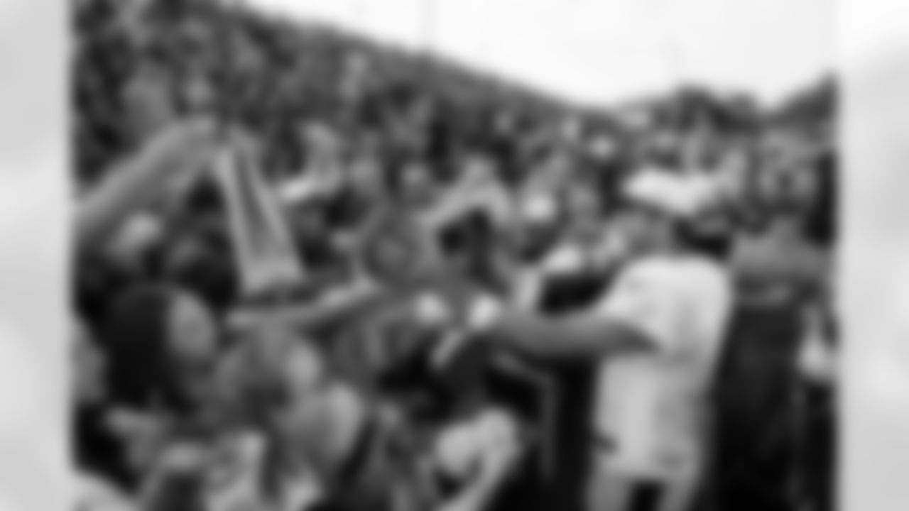 Pittsburgh Steelers quarterback Aaron Rodgers (8) signs autographs at Latrobe Memorial Stadium during the 2025 Steelers Training Camp on Friday August 1, 2025 in Latrobe, PA. (Karl Roser / Pittsburgh Steelers)