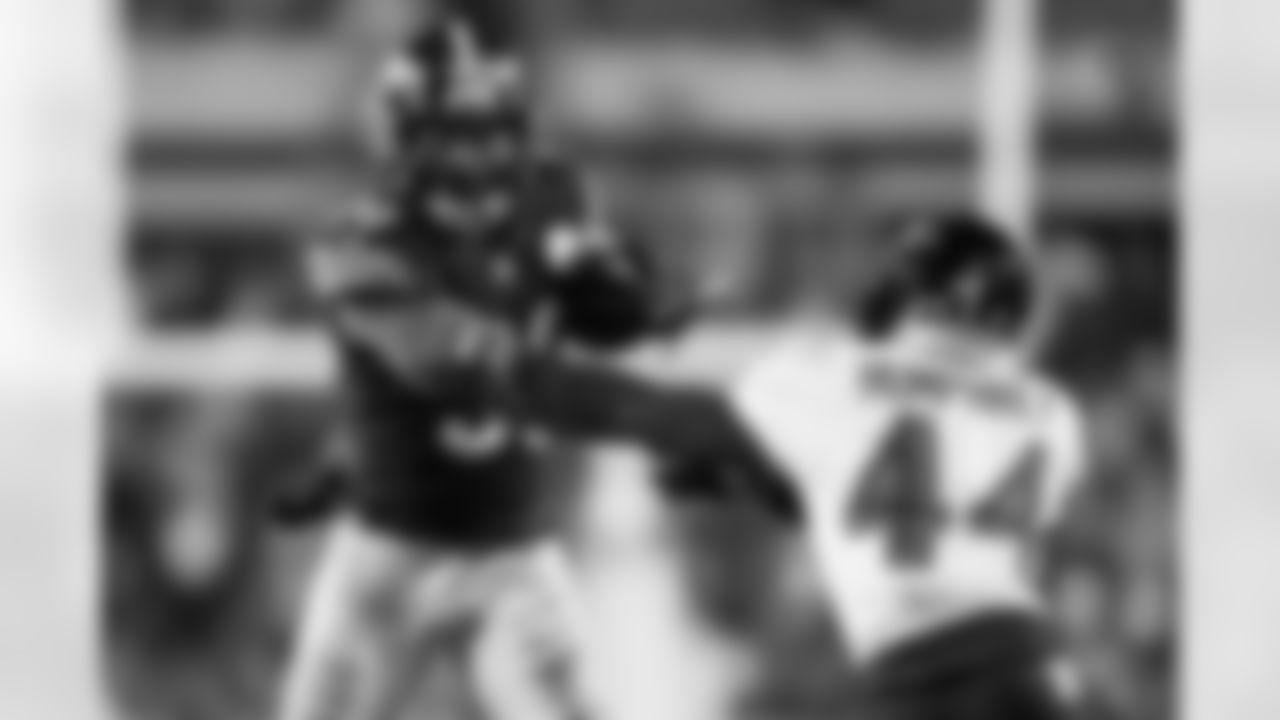 Pittsburgh Steelers running back Jaylen Warren (30) stiff arms an opponent during a regular season game against the Baltimore Ravens, Sunday, Jan. 4, 2026 in Pittsburgh, PA. The Steelers defeated the Ravens 26-24. (Alysa Rubin / Pittsburgh Steelers)