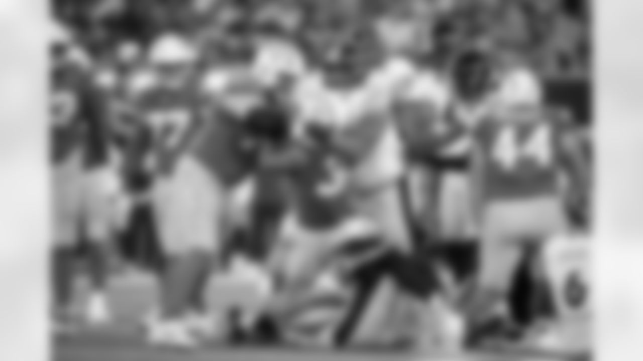 Pittsburgh Steelers defensive tackle Derrick Harmon (99), linebacker Payton Wilson (41), and linebacker T.J. Watt (90) make a tackle during a regular season game between the Pittsburgh Steelers and the Los Angeles Chargers, Sunday, Nov. 9, 2025 in Inglewood, CA. The Chargers beat the Steelers 25-10. (Karl Roser / Pittsburgh Steelers)